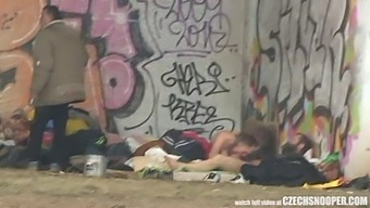 A Homeless Threesome Engages In Sexual Activity On The Streets In This Homemade Video