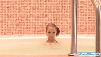 Young Paris Milan In A Swimsuit Indulges In A Jacuzzi For Your Pleasure