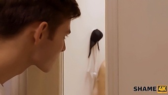 A Younger Man Joins An Older Blonde Woman In The Shower And Engages In Sexual Activity